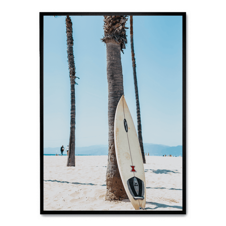 Surfboard By A Palm Tree