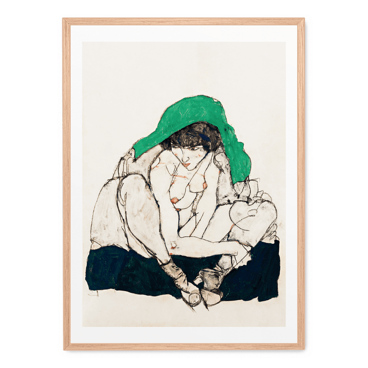 Crouching Woman With Green Headscarf